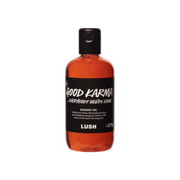 A clear bottle filled with translucent, bright orange Lush Good Karma... Everybody Needs Some shower gel, topped with a black cap and featuring a black label