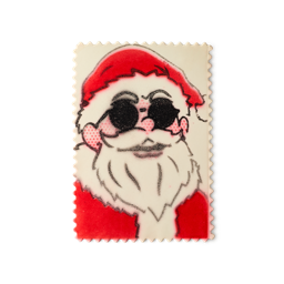 Lather Christmas. A rectangular sheet of surfactant paper shaped like a postage stamp with perforated edges, featuring a pop-art illustration of Santa Claus wearing dark sunglasses