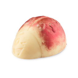 Love Bug Scrubee. A large, creamy, ladybug-shaped solid body scrub. The product features heart-shaped spots on the wings, a cheeky winking face and a coating of shimmering, red lustre.