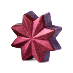 Ruby Comet. An eight-pointed star-shaped bubble bar with a shimmering, metallic ruby-red front face and a deep purple back