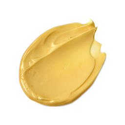 Sticky Dates. A neatly smeared swatch of thick, creamy, golden-yellow body lotion. 