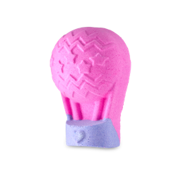 Up, Up and Away. A playful bath bomb shaped like a hot air balloon. The basket is purple with an embossed heart shape, and the balloon is a bright pink colour with an embossed zigzag and starry design.
