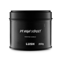 29 High Street. A round, black, candle tin with a removable lid. The black label on the front reads "29 High Street" in white text.