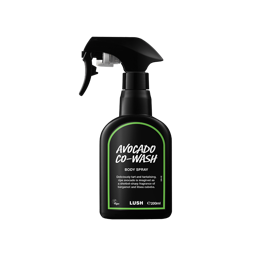 Avocado Co-Wash. A black spray bottle of Lush Avocado Co-Wash Body Spray. The product label is black with a lime green banded border. White text states the product name and the scent description.