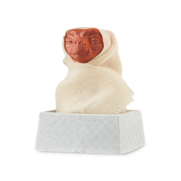 E.T. A fun, two-part bath bomb with a removable head of the classic film, alien character E.T. The product is wrapped in a muslin cloth and sits in a square, silver basket base. 
