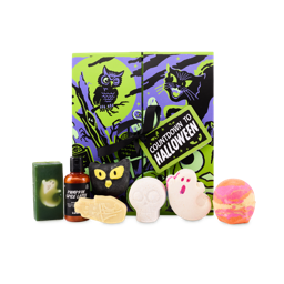 The image shows a 'COUNTDOWN TO HALLOWEEN' gift box with green and purple cat and owl illustrations. Six LUSH Halloween bathing products, including bath bombs, soap, shower gel, bubble bar, and a massage bar products, sit in front of the box.