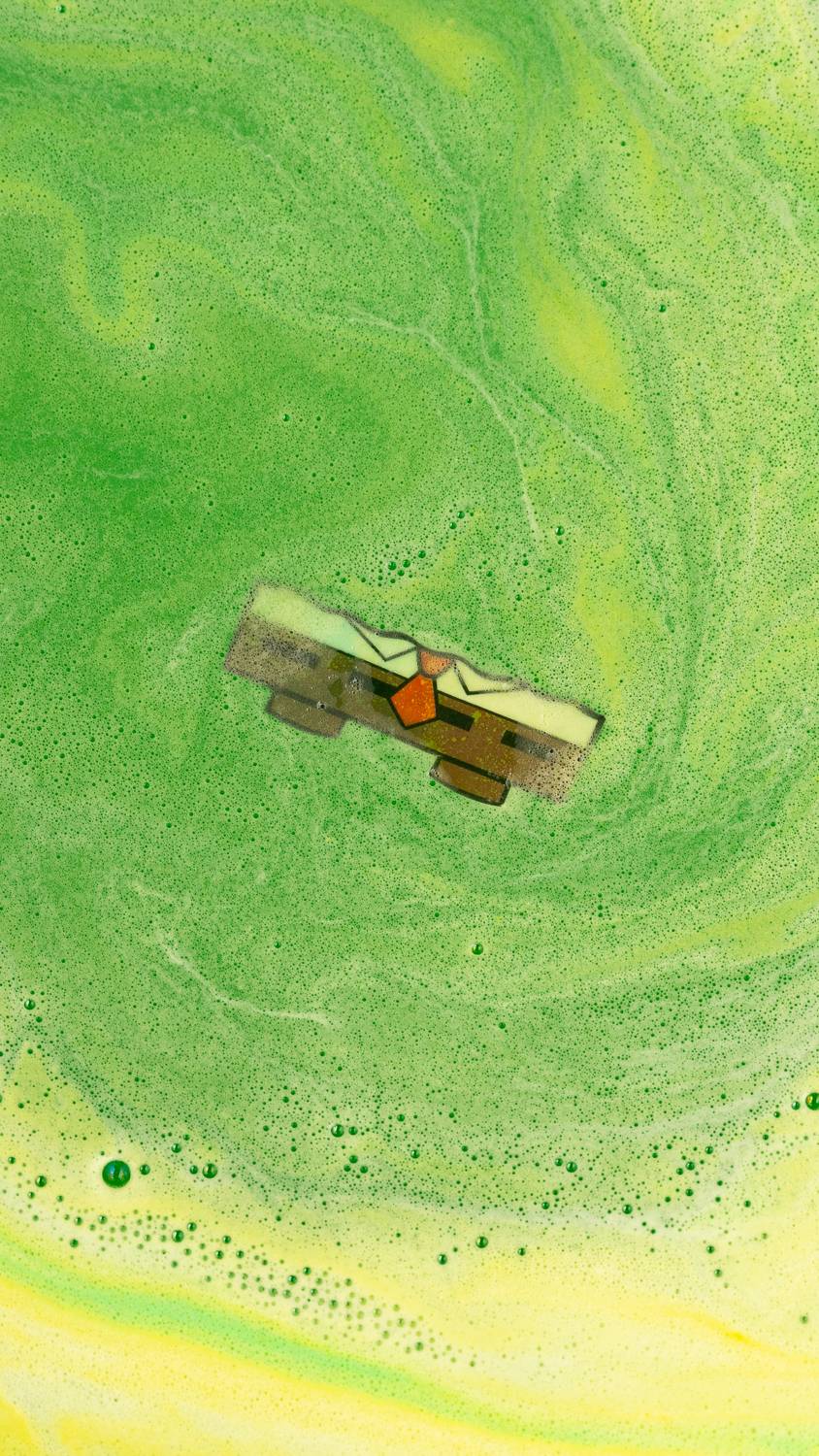 A close-up of Spongebob’s staple shirt and shorts printed on rice paper among a sea of green foam.