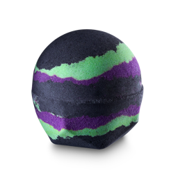 The Afterlife. A classic, LUSH, spherical bath bomb with a geometric base. It has a dark, black base colour with two bright green and purple splashed rings. 