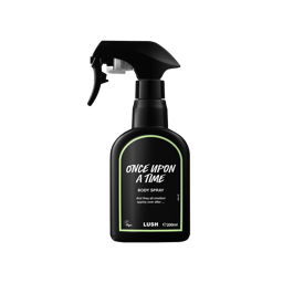 Once Upon A Time body spray. A black spray bottle of Lush "Once Upon A Time" Body Spray. The product label is black with a pale green banded border. White text states the product name and the scent description.