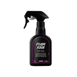 Plum Rain body spray. A black spray bottle of Lush "Plum Rain" Body Spray. The product label is black with a deep purple banded border. White text states the product name and the scent description.