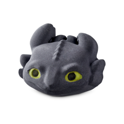 Toothless. A fun, bath bomb shaped like the face of the Toothless dragon character from the How To Train Your Dragon film. The product shows a black, dragon face with big, green eyes, a wide mouth, and big, slicked-back ears.