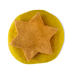A Gold Star. A two-part bubble bar which is comprised of a flat, round yellow base and a large, golden, 6-pointed star on top. There is golden glitter throughout the product 