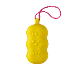 Access All Areas. A smooth, bright yellow soap bar with soft, wavy edges on a pink hanging cord, featuring raised Braille lettering on its surface that spells out the word "Soap".