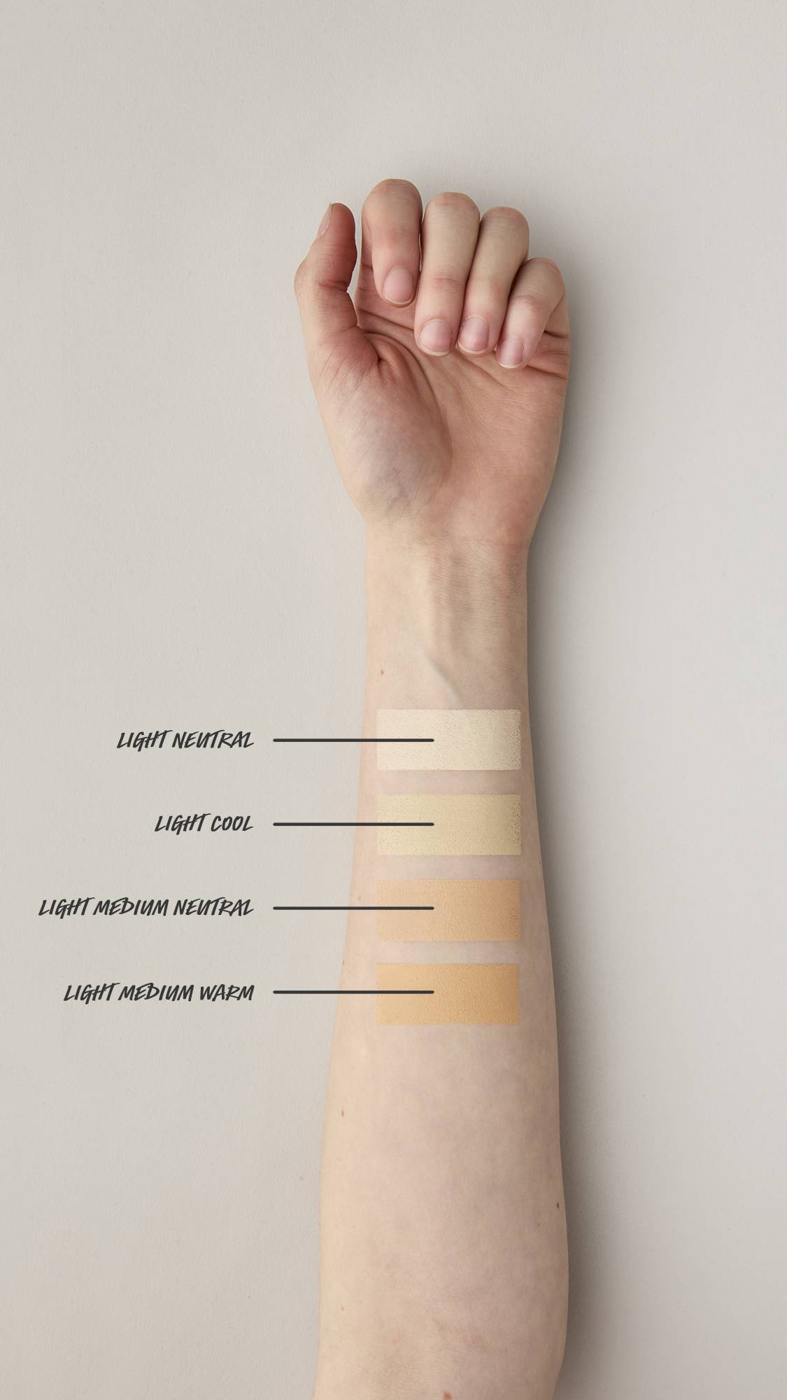 Four swiped swatches of beauty balm are applied to the underside of a light-skinned forearm. Shades are listed from top to bottom: Light Neutral, Light Cool, Light Medium Neutral, and Light Medium Warm, showing the shades against the pale skin tone.
