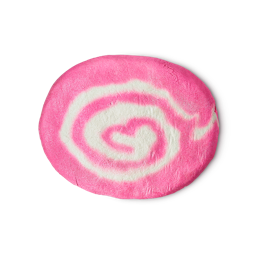 The Big Snow Fairy Roll bubble bar. A large, solid bubble bar in an off-oval shape with a vibrant pink and white spiral design, resembling a Swiss roll. There is a subtle silver lustre covering the product.