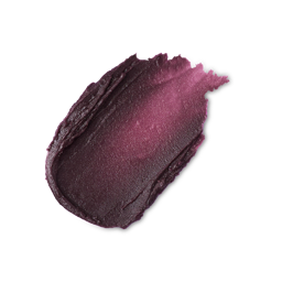 A rich, creamy swatch of Black Rose Lip Stain on a black background. The deep plum color gradients into a lighter berry hue with a smooth, pigmented texture.