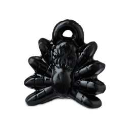 A glossy, jet-black shower gummy shaped like a spider with molded legs and facial details. It includes a small loop at the top for hanging.