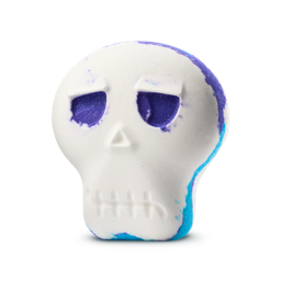 Brain Freeze. A Halloween-themed bath bomb shaped like a cartoon skull. It is a white skull with an embossed triangle nose and sliced mouth. It has purple eyes and flecks of purple and blue colour from the side. 