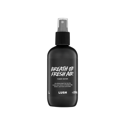 A black spray bottle of Lush Breath of Fresh Air toner water with a clear plastic cap, featuring white text on a black label