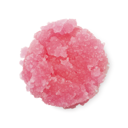 Bubblegum. A neatly piled swatch of thick, textured, vibrant pink lip scrub with visible sugar granules.