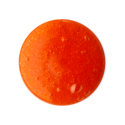 Cempasúchil. A perfectly circular swatch of deep orange, glossy Cempasúchil shower gel. There are flecks of golden shimmer throughout. 
