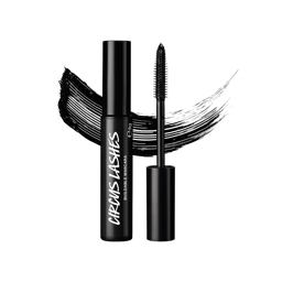 A vertical shot of an open black tube of Circus Lashes ~ Mascara with the wand standing next to it, showing the black bristles. A thick black mascara streak is behind the product, all set against a light grey background.