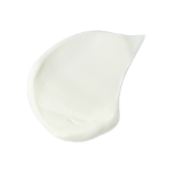 Cocoa Butter. A neatly smudged swatch of creamy, white, hand and body lotion.