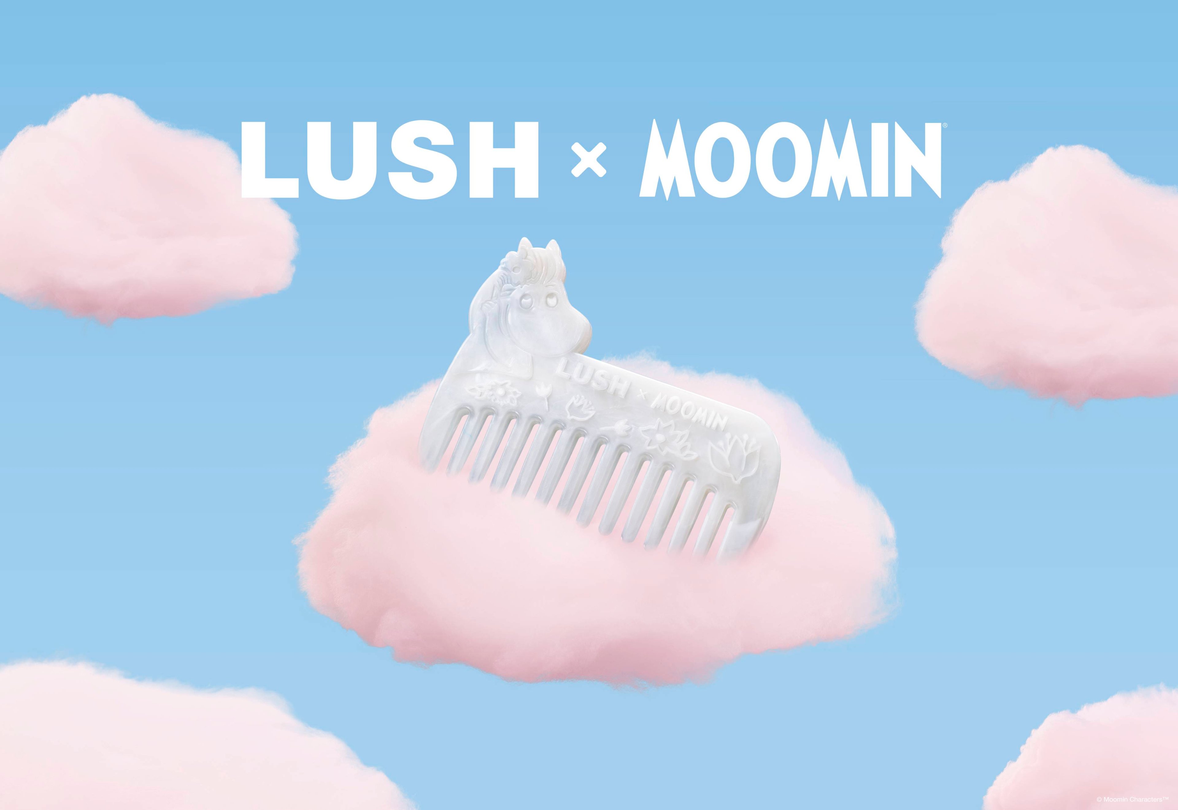 A pearlescent white Snorkmaiden hair comb rests in a fluffy pink cotton candy cloud. The scene is set against a pastel blue sky background featuring more pink clouds and the bold white text "LUSH x MOOMIN" across the top.