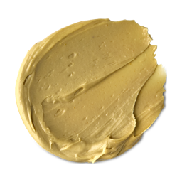 Cosmetic Warrior. A creamy, round, spread swatch of golden-yellow face and body mask.