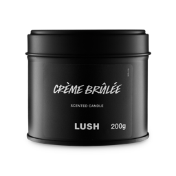 Crème Brûlée. A round, black, candle tin with a removable lid. The black label on the front reads "Crème Brûlée Scented Candle" in white text.