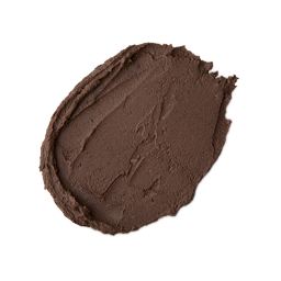 Cupcake. A neatly smeared swatch of thick, dark brown clay-like face mask with a matte, textured finish.