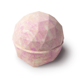 Diamond Dust. A round, light pink, yellow and cream bath bomb, full of glitter. The top mimics the texture of a diamond.