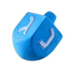 Dreidel, Dreidel, Dreidel. A deep blue bath bomb shaped like the classic, Jewish, wooden spinning-top game toy. There is a pointed bottom and nubbed handle with silver letters embossed on the four sides. 