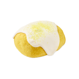Easy Peasy Lemon Squeezy. A Lush bubble bar in the shape of a lemon drizzle. There is a rounded, yellow base, covered in a white layer resembling icing, and topped with a dusting of yellow salt granules on top.