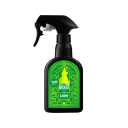 Elphaba Thropp. A classic, black, recycled plastic body spray bottle. There is a bright green label on the side with a lime green Wicked X Lush Logo and product name. 
