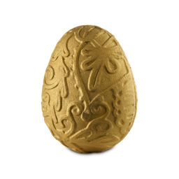 Fab Egg. A perfectly egg-shaped bubble bar. The product is decorated with embossed swirling designs and covered in a glittering, golden lustre. 