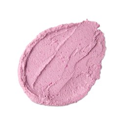 Family Face Time. A neatly smeared swatch of thick, light-pink, textured face mask with a matte finish, small flecks of dark pink, and visible swooping peaks from being spread.
