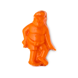 Father Christmas On Holiday. A vibrant, orange gelatinous shower jelly in the shape of a topless Santa Clause figure in shorts and sunglasses.