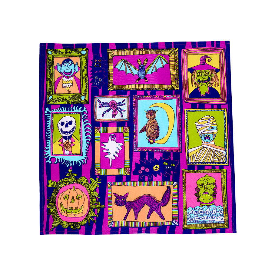 Fearsome Friends. A square, multicoloured fabric knot wrap with a gallery of framed monster portraits. It features a vampire, a witch, a mummy, a spider and a skeleton, and more against a bold purple and pink striped background.