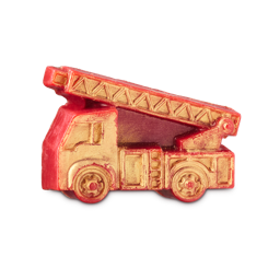 Flame Fighters. A thick slice of deep, red soap. It is shaped to look like the side view of a traditional fire engine vehicle complete with a ladder on top. The product is coated in a golden lustre on the surface. 