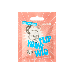 Flip Your Lid. A sealed, salmon-coloured sachet packet. An illustration shows a bald male with their wig tipped off. The text reads: No Drought. Lush Flip Your Wig. Wig Out! Silver Dry Shampoo.