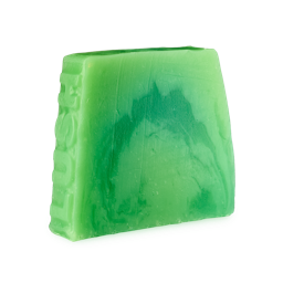 A thick, rectangular bar of marbled green Freshly Ever After soap stands on a light grey background. The soap features swirls of bright lime green and a deeper forest green, and the left edge is textured with an embossed pattern.