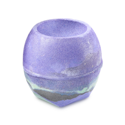 Goddess. A round bath bomb with a bowl-shaped indentation on top. It is primarily vibrant purple with a marbled band of grey and mint green around the base and coated with shimmering silver lustre.
