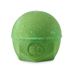 Green Fairy. A spherical bath bomb with a flat, geometric base. The product is a deep, forest-green colour with the number "30" embossed on the side. 