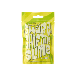 Shape Shifting Slime. The image shows a bright sealed, paper sachet with a bold yellow and green wavy pattern on. The name reads "Green Jelly Slime. Shape Shifting Slime" in white, bubble text on the front.