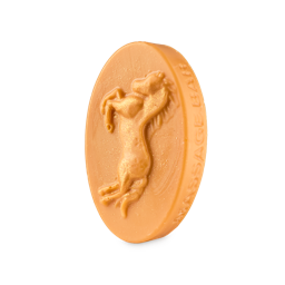 The oval HorsePower Massage Bar features a raised rearing horse design and embossed text on its side, glistening with gold Plastic Free Glitter against a light background.