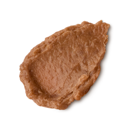 Hot Chocolate Orange. A neatly smeared swatch of thick, creamy light-brown lip butter with a soft, textured finish