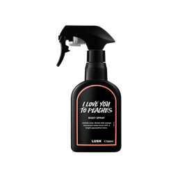 I Love You To Peaches. A black spray bottle of Lush "I Love You To Peaches" Body Spray. The label features peach-coloured trim and text describing notes of wild orange, peach, and passionfruit.