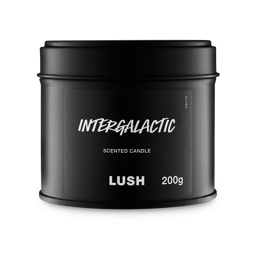 Intergalactic. A round, black, candle tin with a removable lid. The black label on the front reads "Intergalactic" in white text.