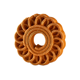 Jalebi. A circular, golden-bronze Lush bubble bar coated in fine shimmer, featuring an intricate wheel design with a central hole and scalloped, swirled petals